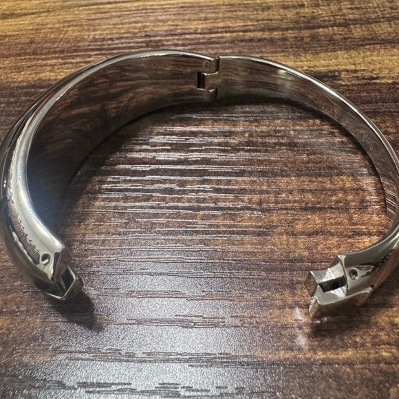 Calvin Klein Shiny Stainless Steel Bangle Bracelet with Brown Glass Accent - Picture 4 of 14